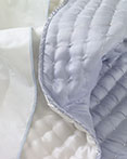 Chenevard Reversible Quilt Sky & Chalk by Designers Guild Bedding